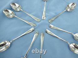 A Vintage Set Of Nine Sterling Silver O/e Rat Tail Coffee Spoons, Sheffield 1937