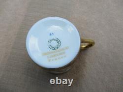 BERNARDAUD & Co LIMOGES BLUE AND GOLD ENCRUSTED DEMITASSE COFFEE CUP AND SAUCER