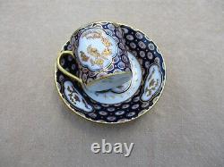 BERNARDAUD & Co LIMOGES BLUE AND GOLD ENCRUSTED DEMITASSE COFFEE CUP AND SAUCER