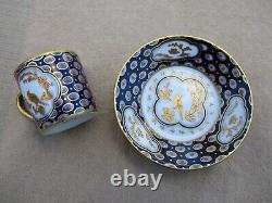 BERNARDAUD & Co LIMOGES BLUE AND GOLD ENCRUSTED DEMITASSE COFFEE CUP AND SAUCER