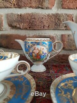 Vintage Bremer and Schmidt Coffee set, 22 k gold plated and hand painted