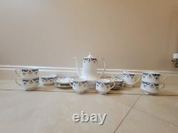 Vintage Paragon Boniston gold, blue and white colored china tea/coffee set