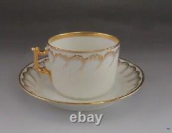 Bel ensemble de 21 pièces en porcelaine dorée ancienne/vintage comprenant 10 tasses à café et thé et 11 soucoupes.