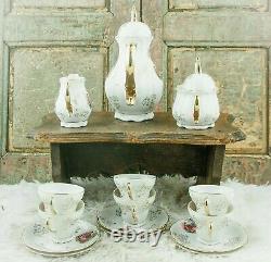 Ensemble de café vintage avec paysage de Limoges: Pot à café, sucrier, crémier, tasses à café en porcelaine.