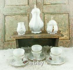 Ensemble de café vintage avec paysage de Limoges: Pot à café, sucrier, crémier, tasses à café en porcelaine.