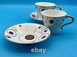Ensemble vintage de deux tasses à thé/café et soucoupes, design bijou en porcelaine Elia.