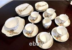 Service à thé Royal Stafford en porcelaine de Chine et assiettes (27 pièces)